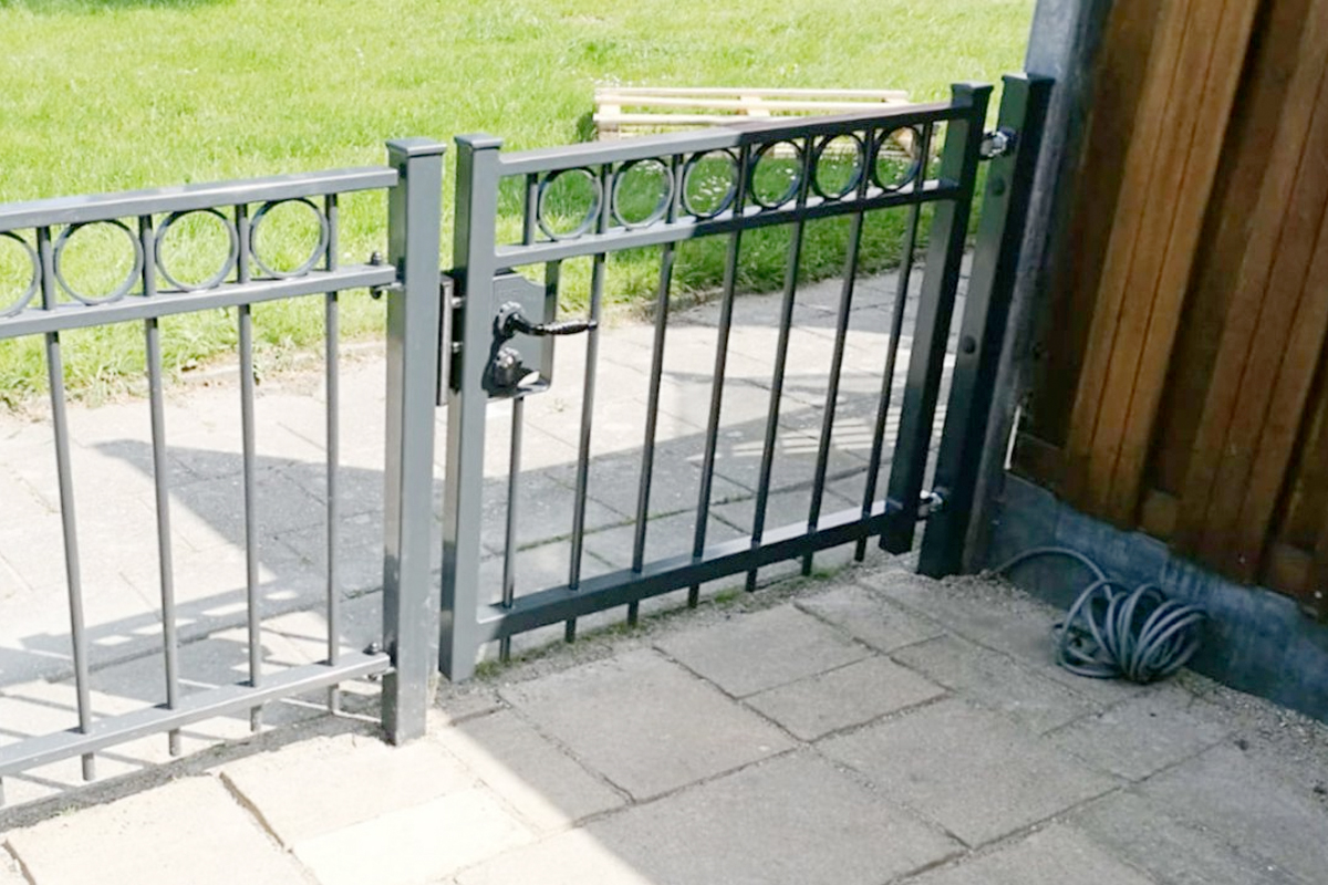 Tuinhek en poort: de perfecte combinatie voor jouw tuin