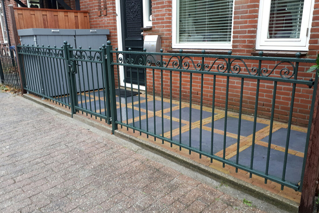 Wat is een metalen tuinhek