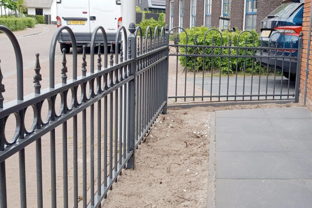 Welk materiaal is het beste voor een tuinhek